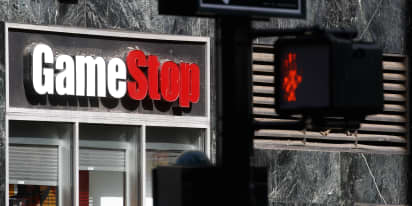 GameStop shares tank as company cuts jobs, quarterly revenue falls 