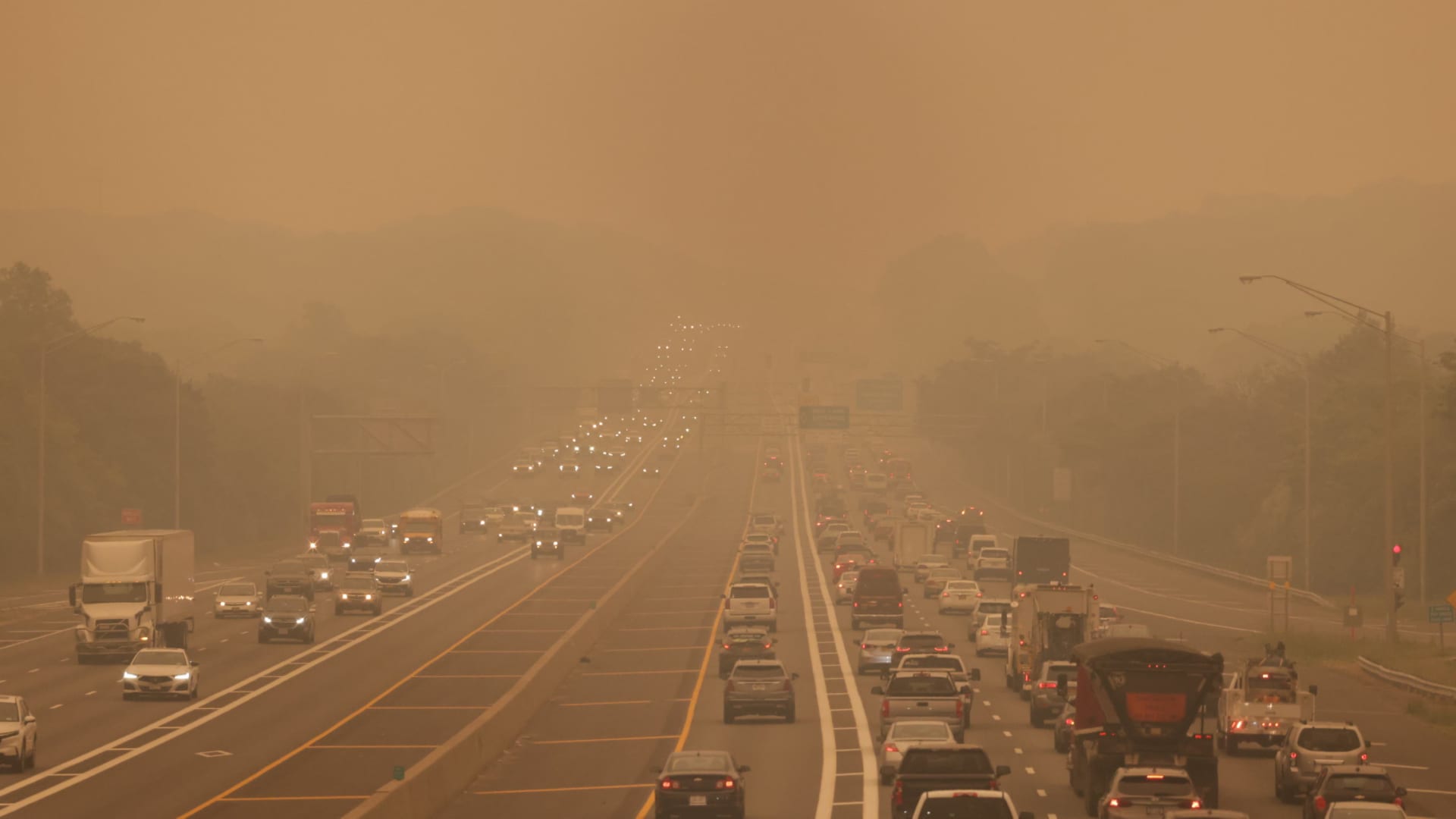 Scene along the Long Island Expressway at exit 58 in Islandia, New York, as smoke from Canadian wildfires blanket Long Island on June. 7, 2023.