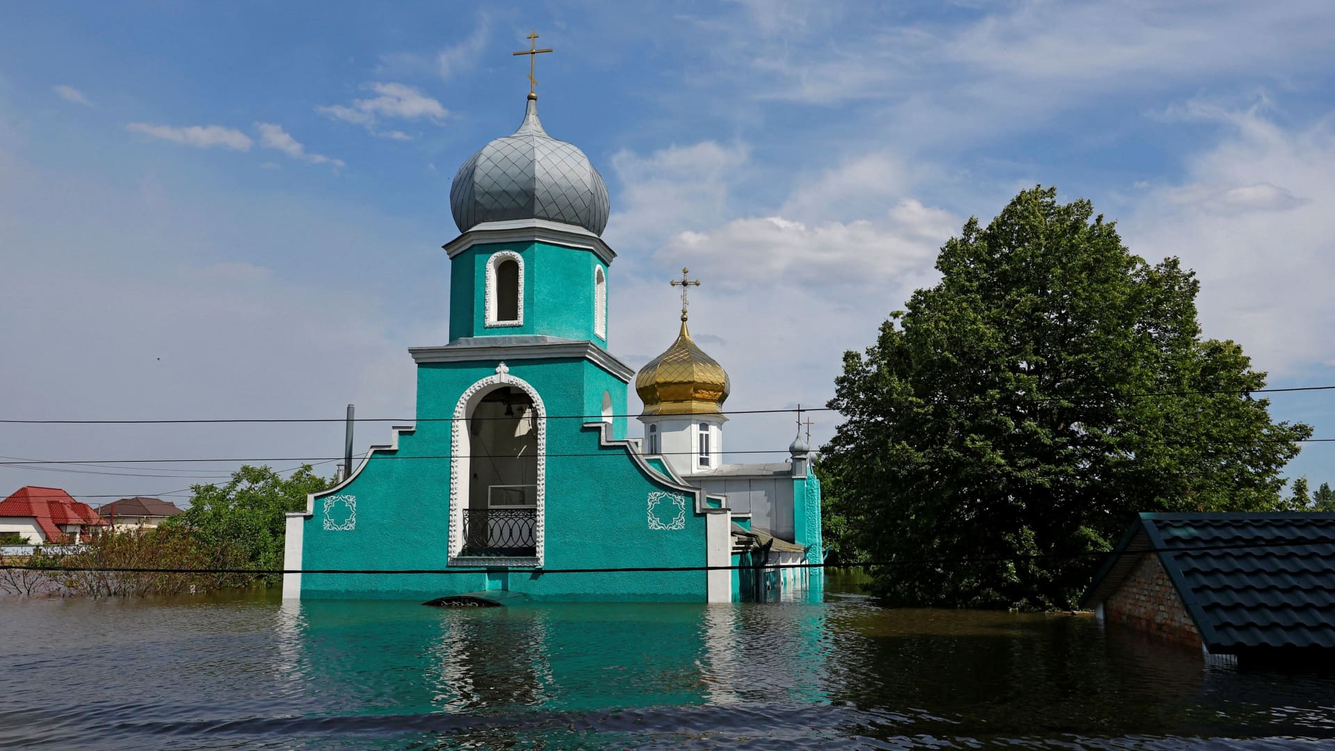 A view shows a flooded church following the collapse of the Nova Kakhovka dam in the course of Russia-Ukraine conflict, in the town of Hola Prystan in the Kherson region, Russian-controlled Ukraine, June 8, 2023. 
