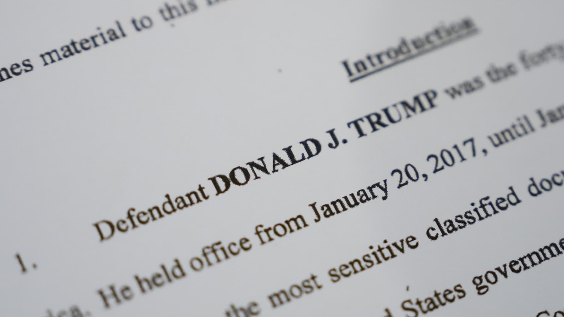  In this photo illustration, pages are viewed from the unsealed federal indictment of former U.S. President Donald Trump on June 9, 2023 in Washington, DC. 