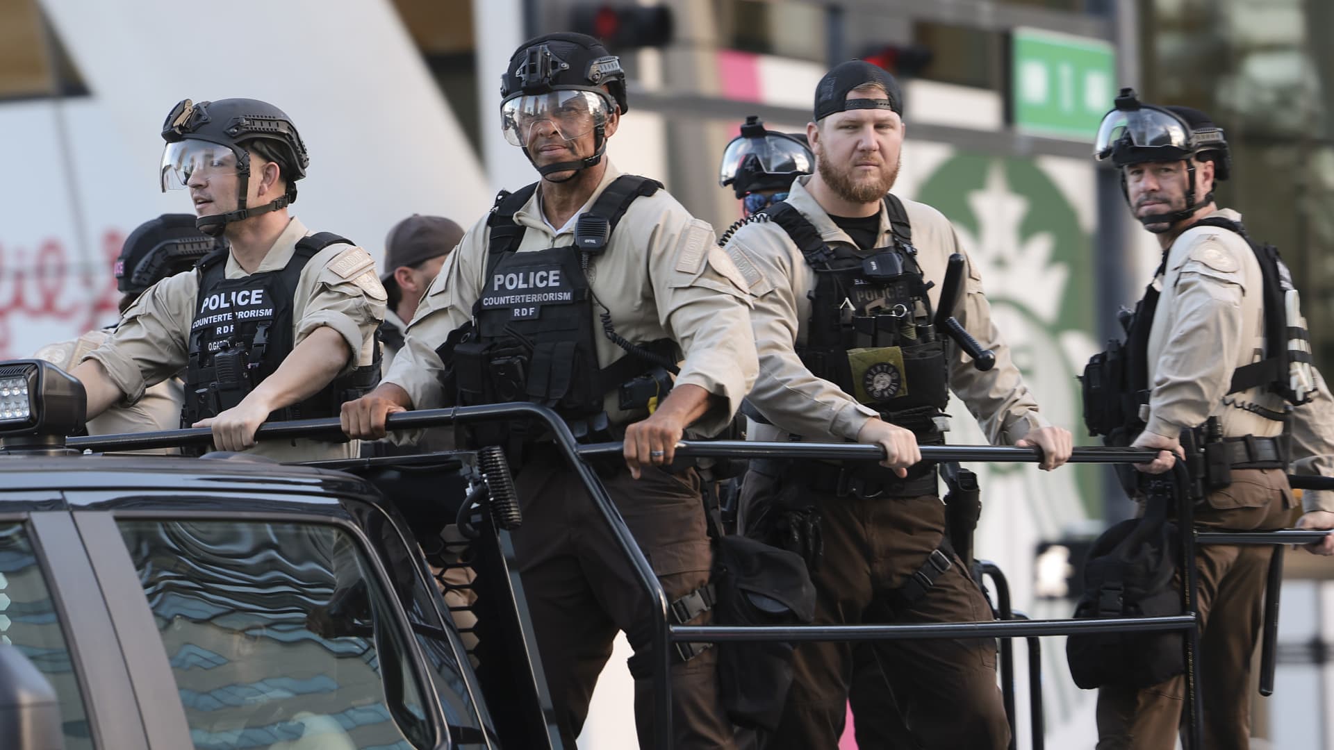 MIAMI, FLORIDA - JUNE 13: Members of law enforcement wearing riot gear ride past the Wilkie D. Ferguson, Jr. U.S. Courthouse on June 13, 2023 in Miami, Florida. Republican presidential candidate former U.S. President Donald Trump is scheduled to appear today for his arraignment on charges including possession of national security documents after leaving office, obstruction, and making false statements. (Photo by Win McNamee/Getty Images)