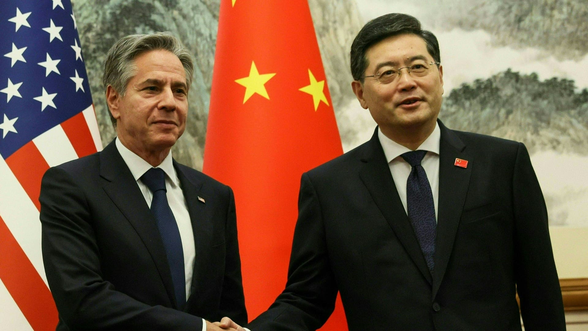 US Secretary of State Antony Blinken (L) and China's Foreign Minister Qin Gang shake hands ahead of a meeting at the Diaoyutai State Guesthouse in Beijing on June 18, 2023. 