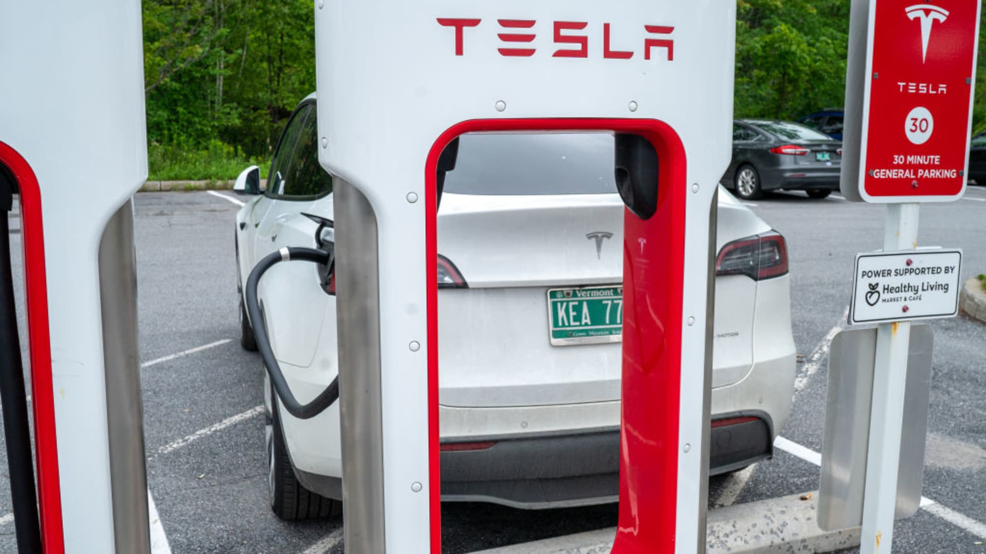 Tesla stands to earn billions of dollars a year by opening U.S. charging stations to drivers of Ford and other EVs