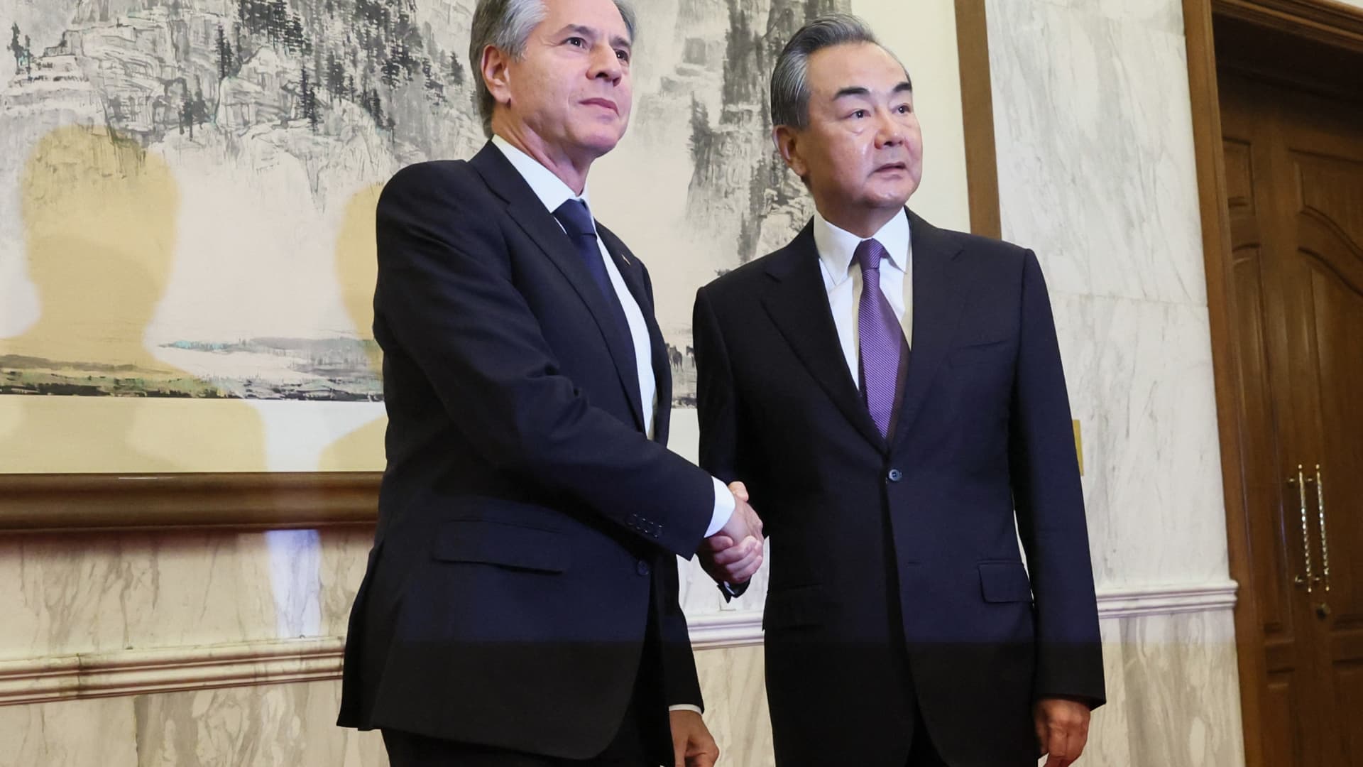 US Secretary of State Antony Blinken (L) shakes hands with China's Director of the Office of the Central Foreign Affairs Commission Wang Yi at the Diaoyutai State Guesthouse in Beijing on June 19, 2023. (Photo by Leah MILLIS / POOL / AFP) (Photo by LEAH MILLIS/POOL/AFP via Getty Images)