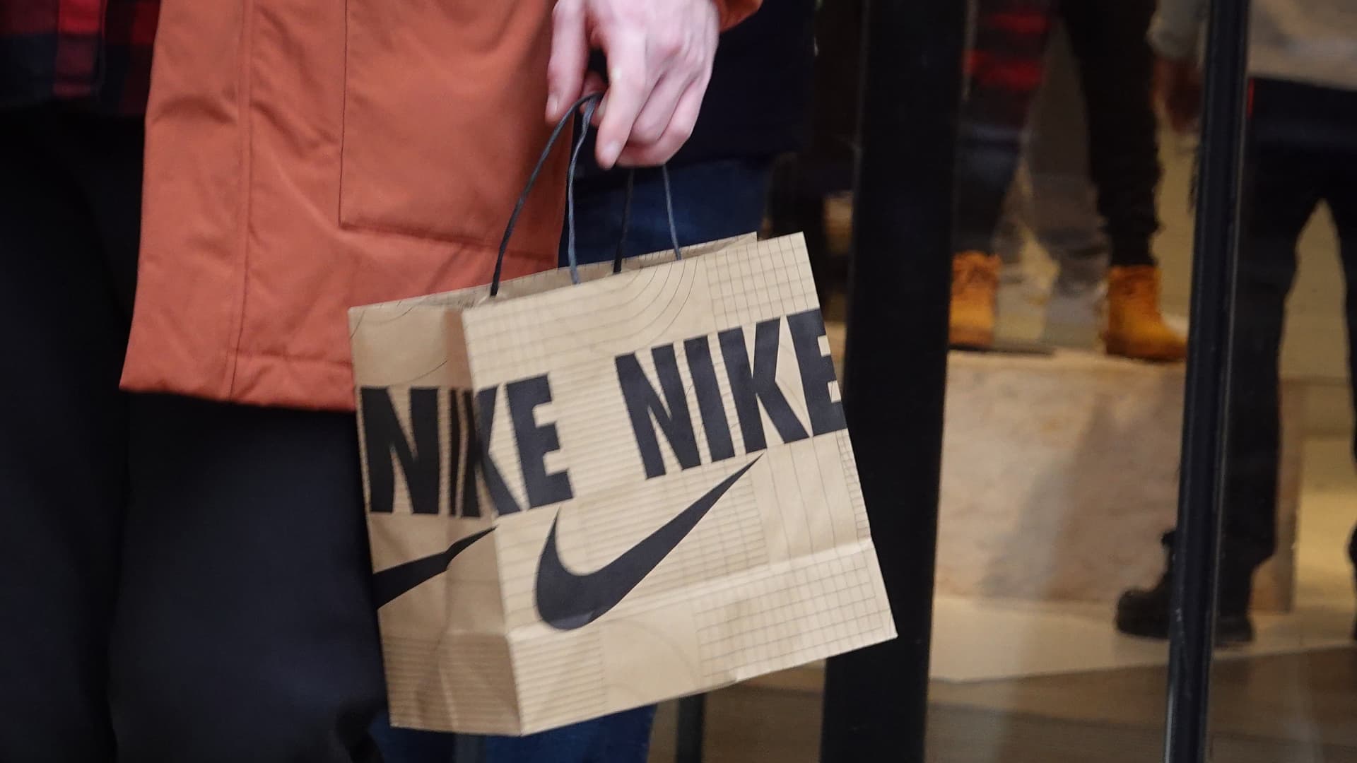 Nike misses on revenue for first time in two years, but stock pops as earnings, margins beat