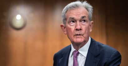 Powell says more 'restriction' is coming on rates