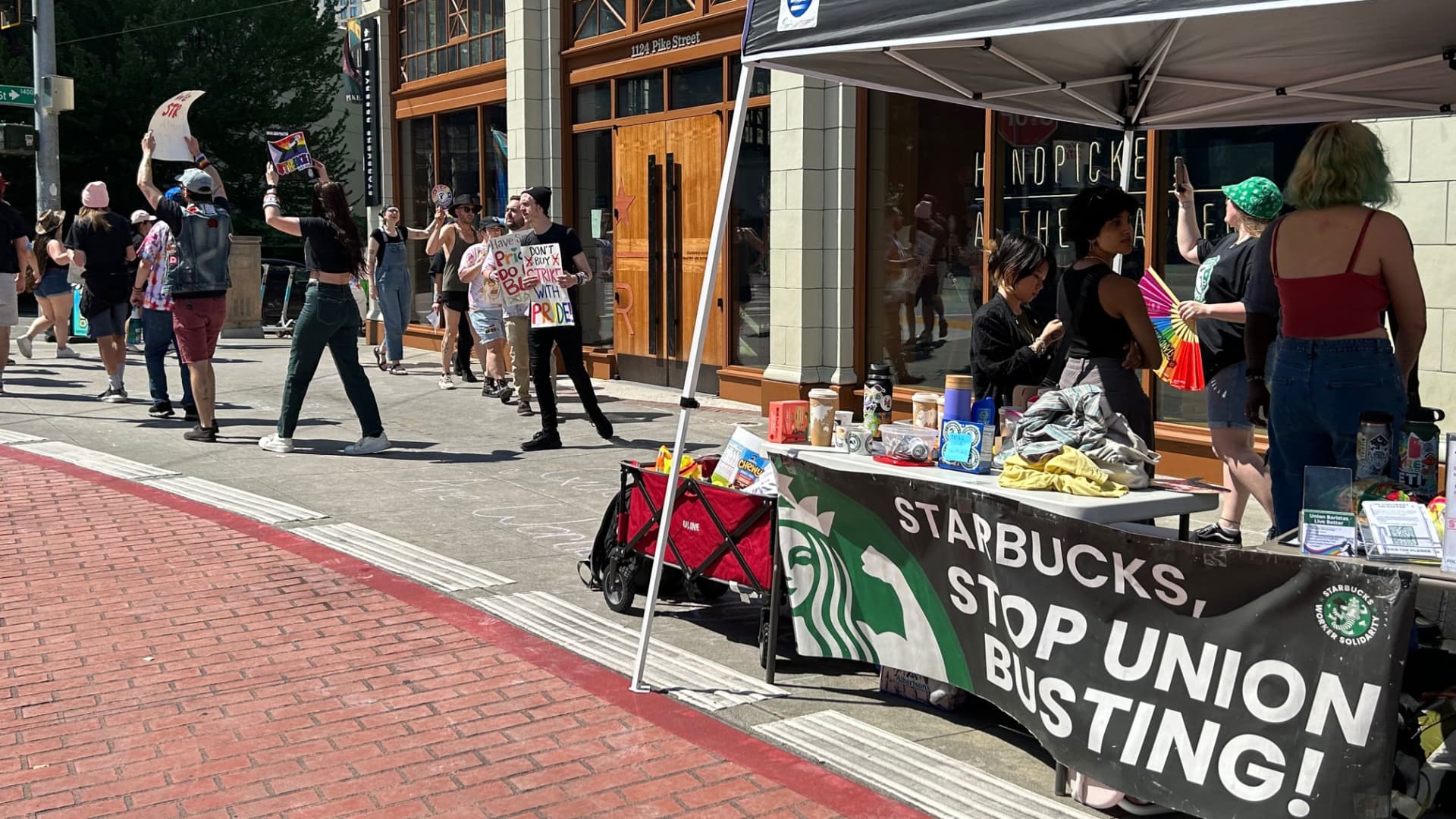 Protesters in Seattle join a Starbucks Workers United strike over what the union alleges is a change in policy over Pride décor in stores. Starbucks maintains it has not changed its policies and encourages stores to celebrate within the company's security and safety guidelines, while the union alleges workers in 22 states where workers have not been able to decorate.