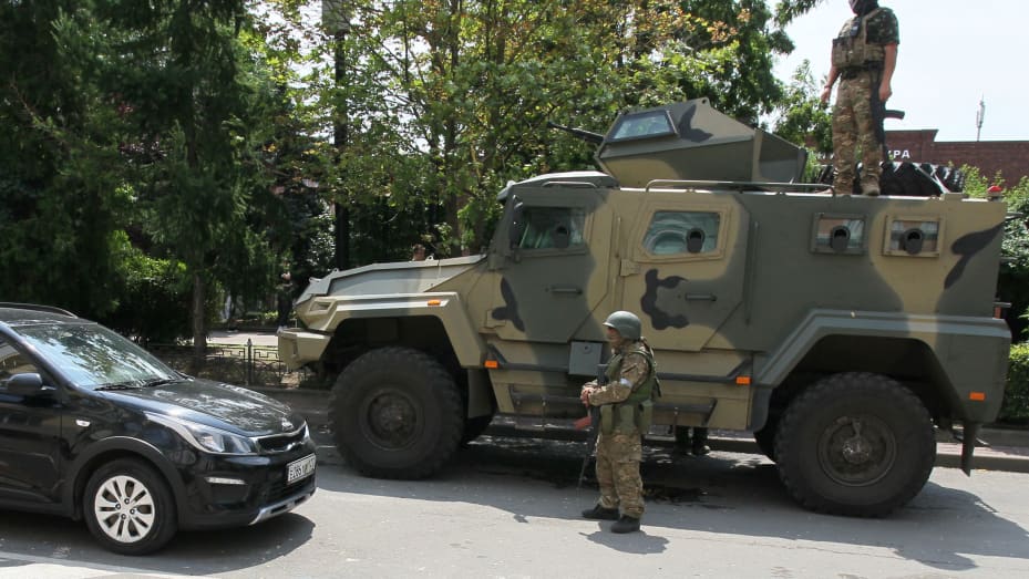 Members of Wagner group stand guard in a street in the city of Rostov-on-Don, on June 24, 2023.