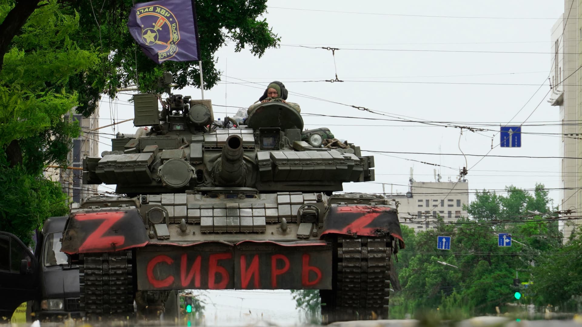 Members of Wagner group sit atop of a tank in a street in the city of Rostov-on-Don, on June 24, 2023.