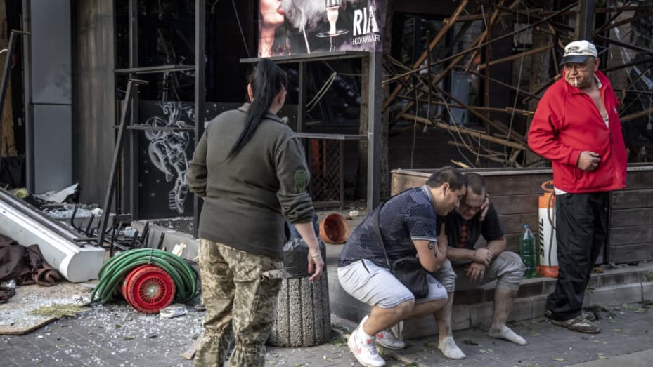 A wounded civilians shed tears after a Russian missile attack hits Ria restaurant in Kramatorsk, Ukraine on June 27, 2023.