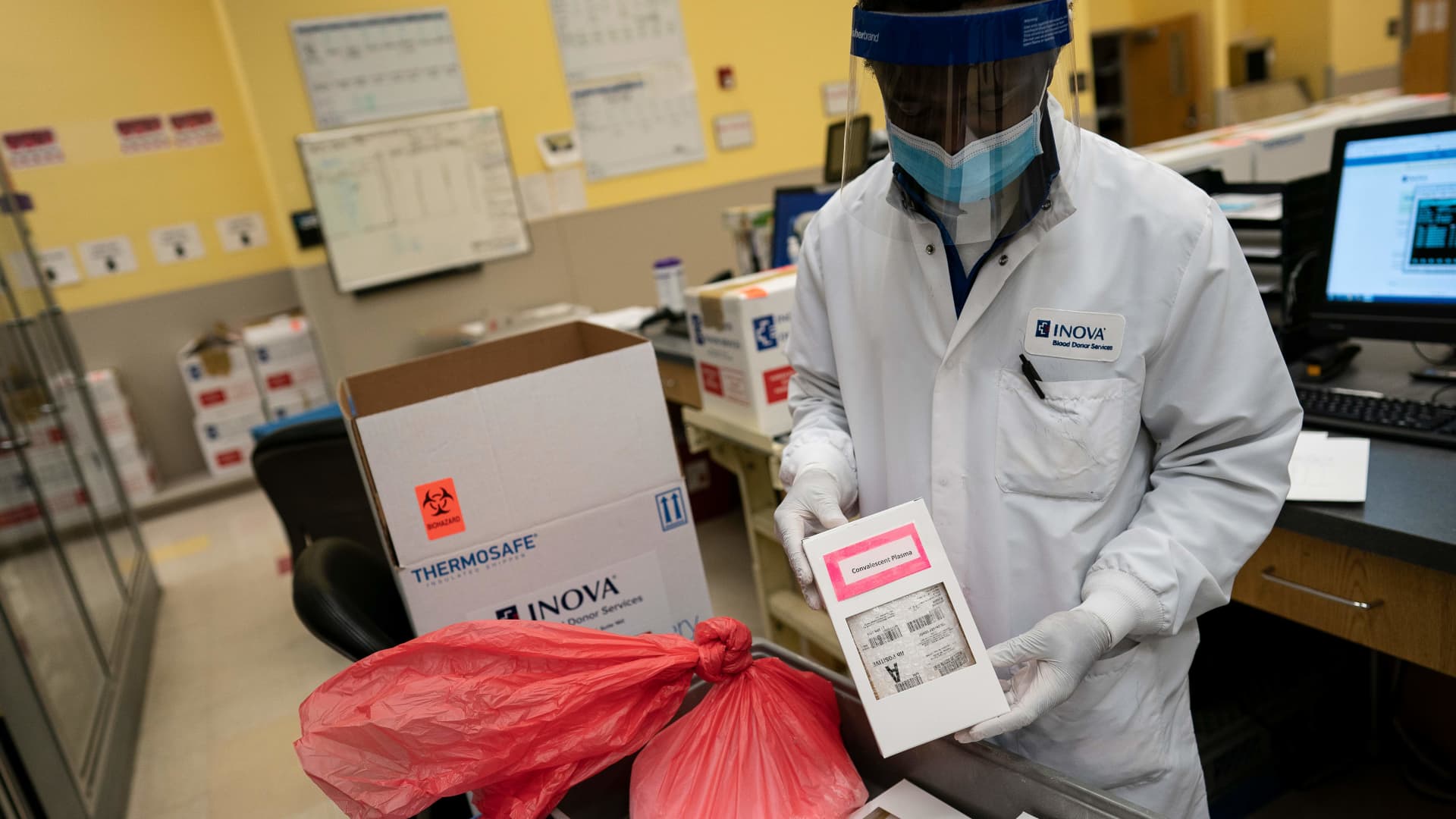 A lab technician freeze packs donated convalescent plasma donated by recovered COVID-19 patients for shipping to local hospitals at Inova Blood Services on April 22, 2020 in Dulles, Virginia.