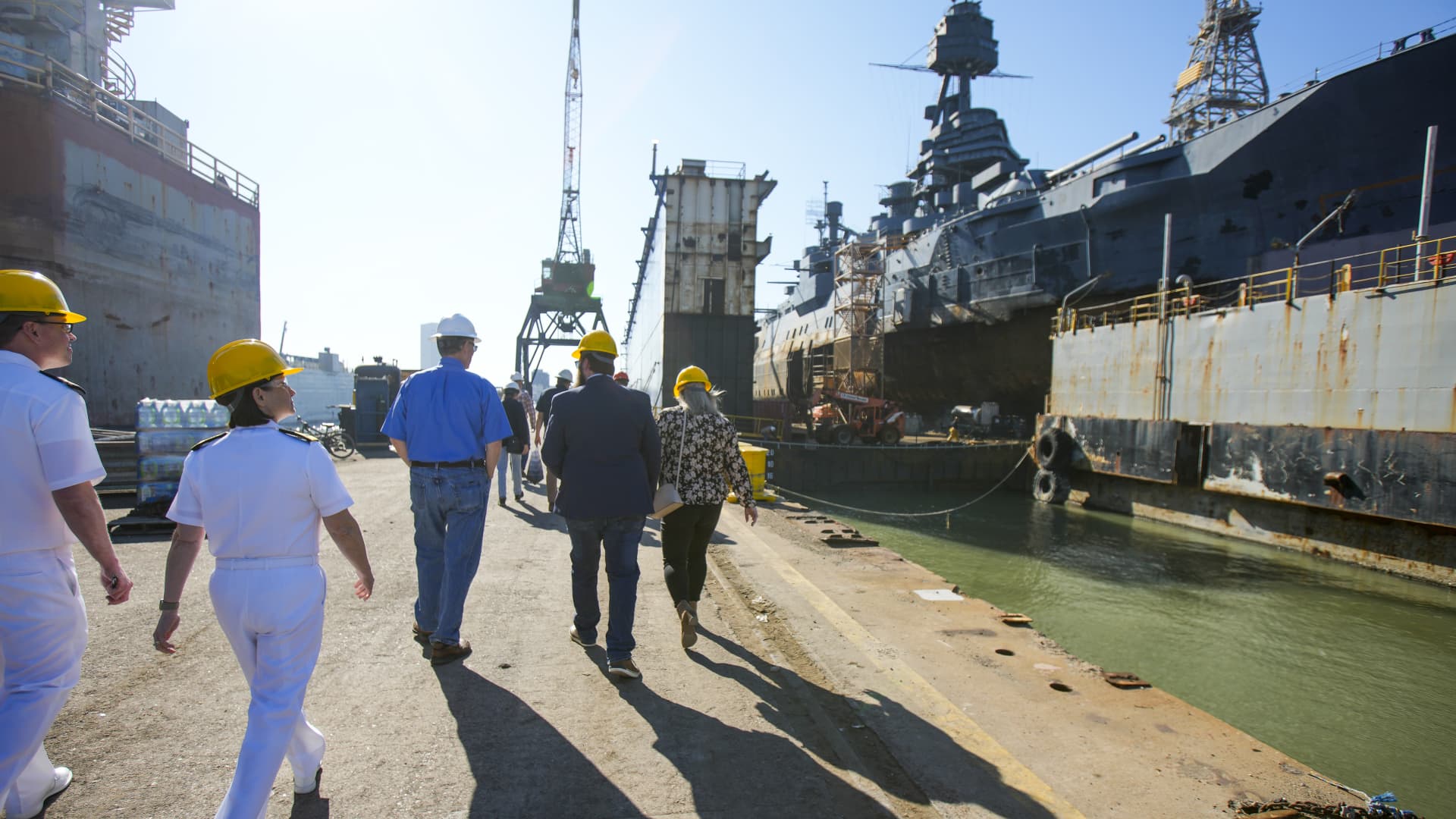 Rear Adm. Jennifer Couture, Commander Naval Service Training Command, left, visits Battleship Texas in its dry dock and Gulf Copper as part of Navy Week Houston on Thursday, Oct. 27, 2022 in Galveston.