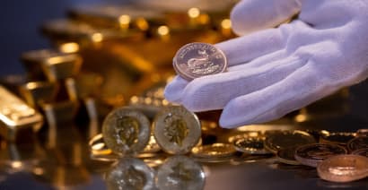 Safe-haven gold gains on MidEast conflict; US data in focus