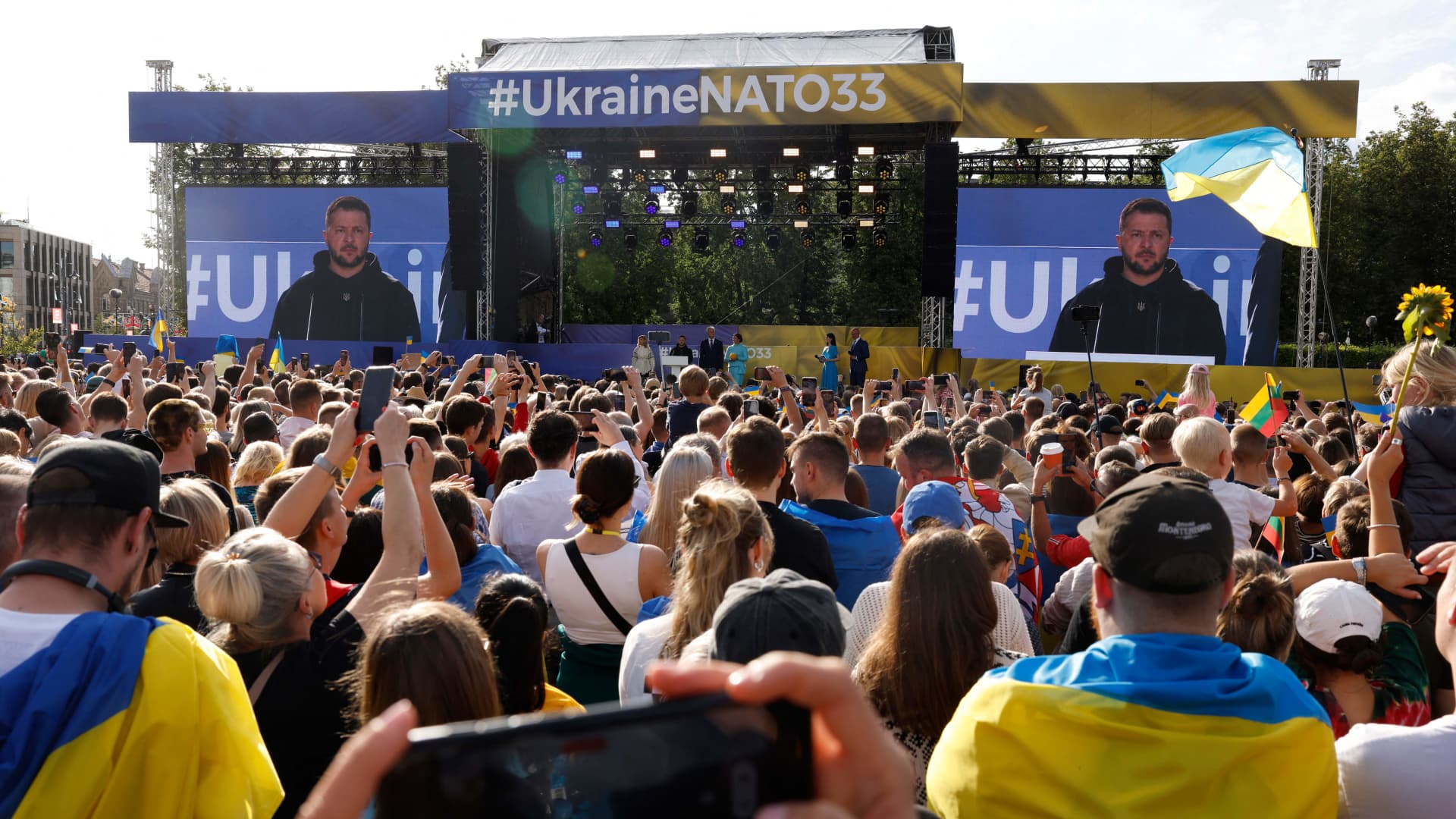 Ukrainian President Volodymyr Zelenskyy addresses a crowd at Lukiskiu Square in Vilnius, Lithuania, during a NATO Summit, July 11, 2023.