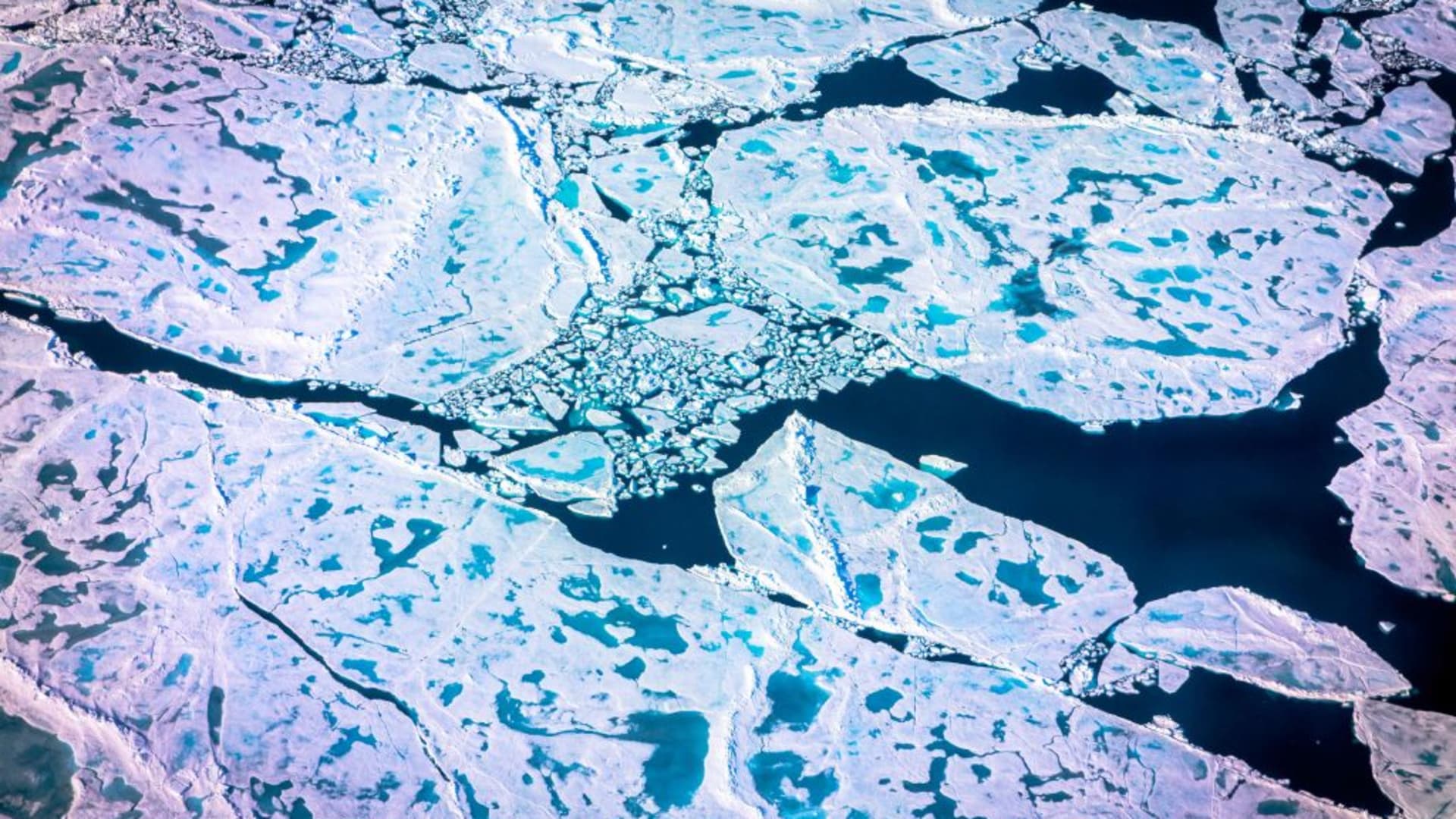 An aerial view of pancake ice and melt on July 19, 2022 as captured on a NASA Gulfstream V plane while on an airborne mission with University of Texas scientists to measure melting Arctic sea ice. New observations from ICESAT-2 show remarkable Arctic Sea ice thinning in just three years. Over the past two decades, the Arctic has lost about one-third of its winter sea ice volume, largely due to a decline in sea ice that persists over several years, called multiyear ice, according to a new study. The study also found sea ice is likely thinner than previous estimates.