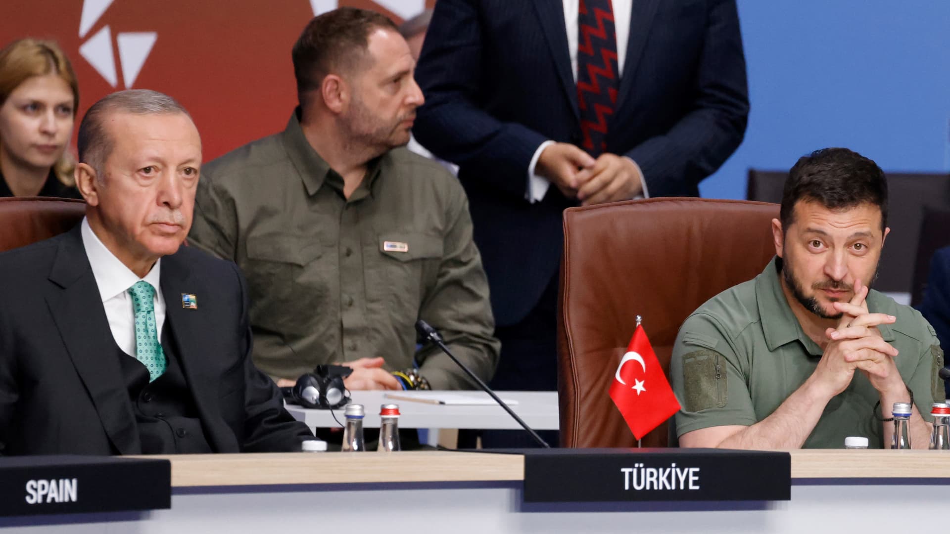 Ukrainian President Volodymyr Zelensky and Turkey's President Recep Tayyip Erdogan wait before a working session on Ukraine at the NATO summit, in Vilnius on July 12, 2023. 
