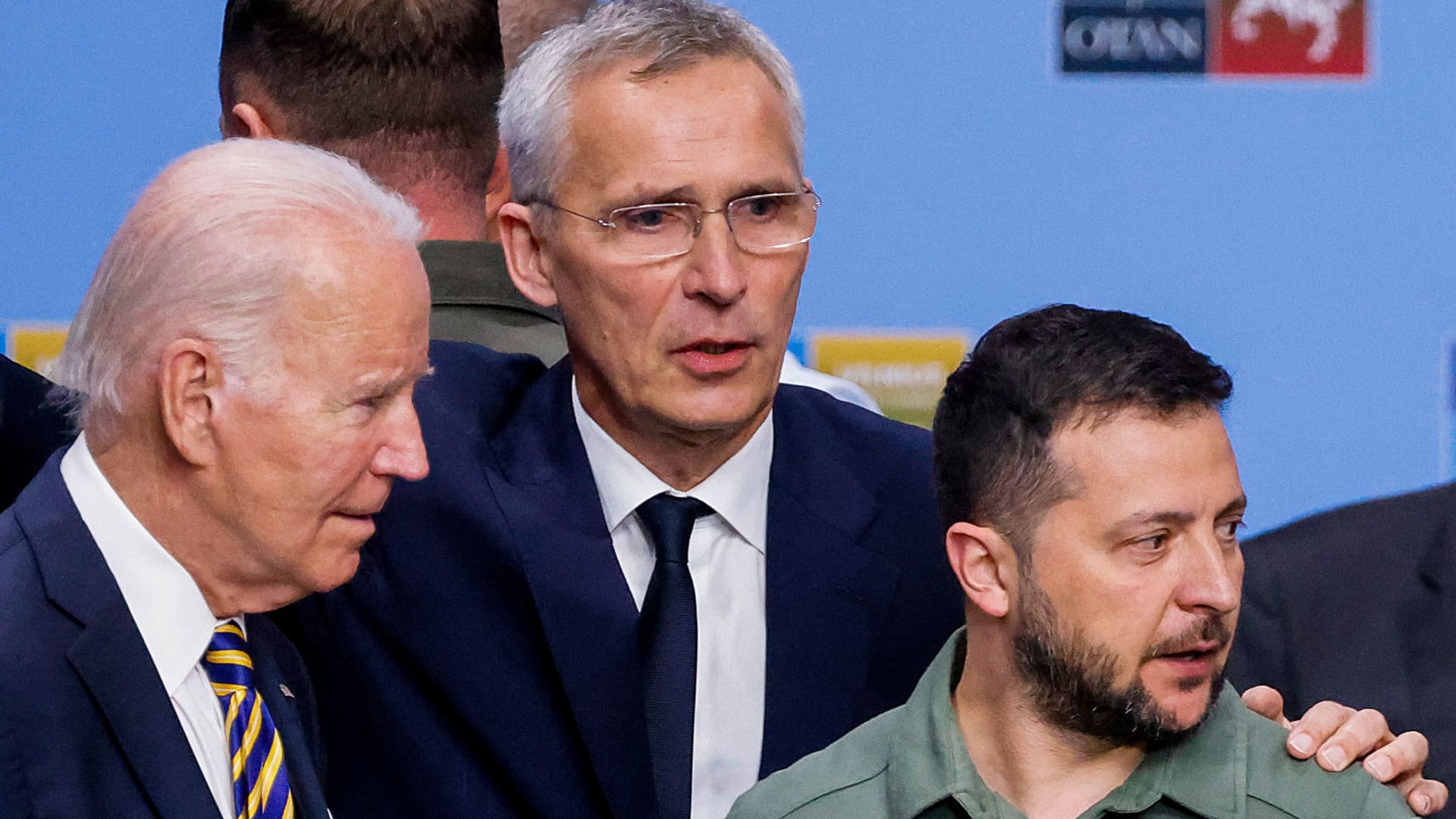 (From L) US President Joe Biden, NATO Secretary General Jens Stoltenberg and Ukraine's President Volodymyr Zelensky talk ahead of a working session on Ukraine during the NATO summit, in Vilnius on July 12, 2023. 