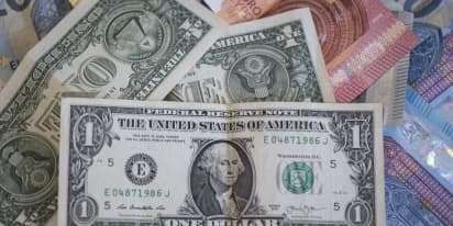 U.S. dollar perks up after sharp losses, but downtrend still intact 