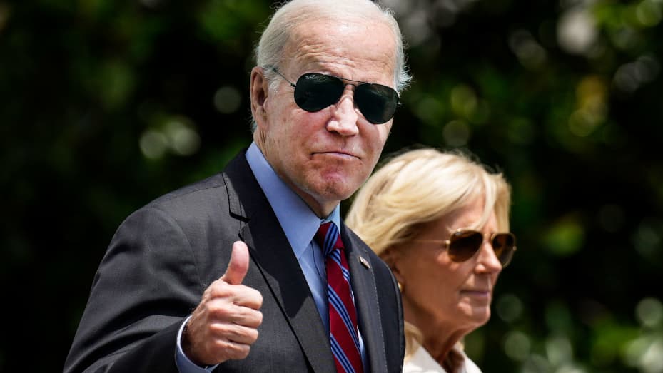 U.S. President Joe Biden gives a thumbs up as he walks with first lady Jill Biden to Marine One on the South Lawn of the White House July 14, 2023 in Washington, DC.