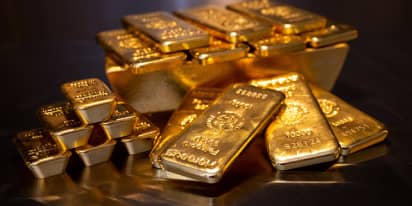 Gold hits record highs on safe-haven demand, US rate cut bets 