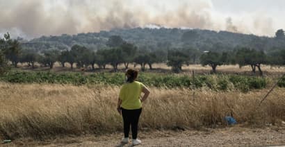 Soaring temperatures in Europe near record as wildfires rage