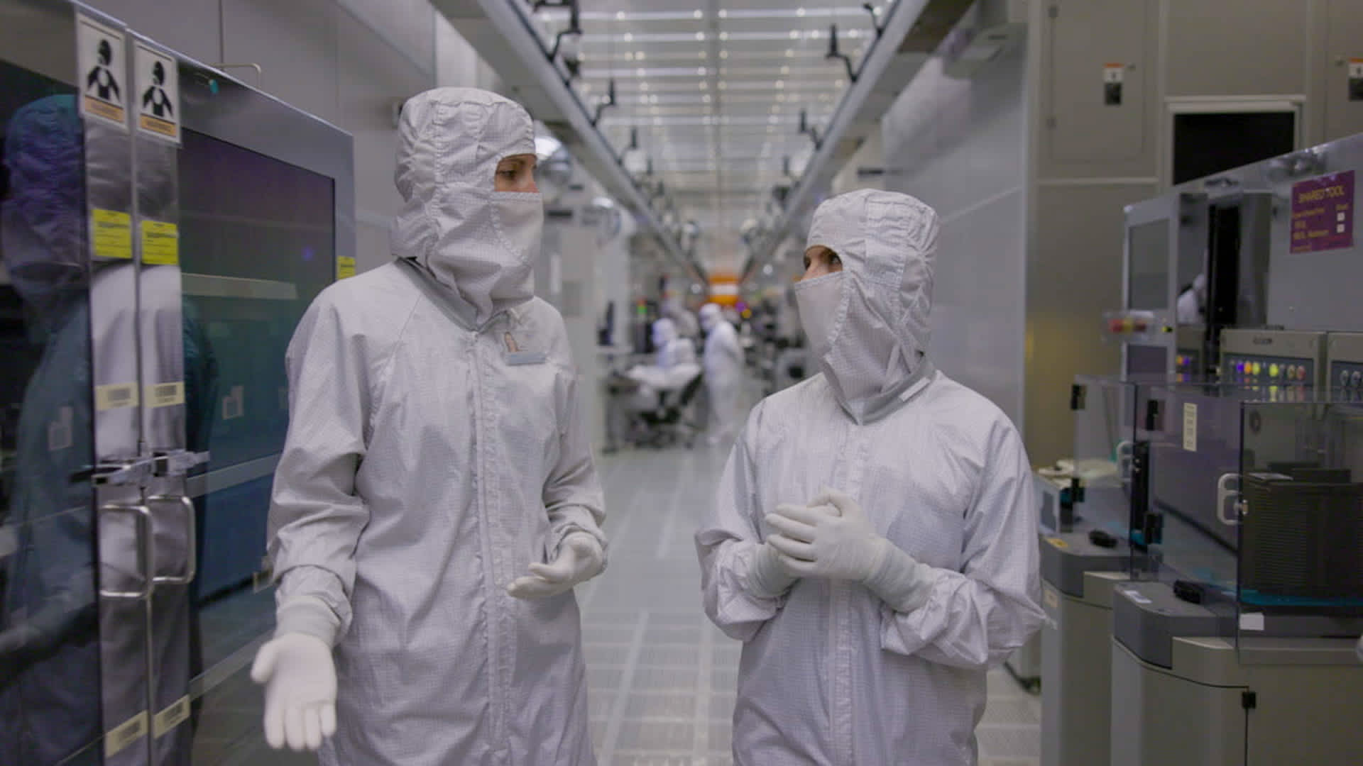 Melissa Hebert, Infineon's senior manager of Austin site projects shows CNBC's Katie Tarasov around inside the Infineon chip fabrication plant in Austin, Texas, on June 14, 2023.