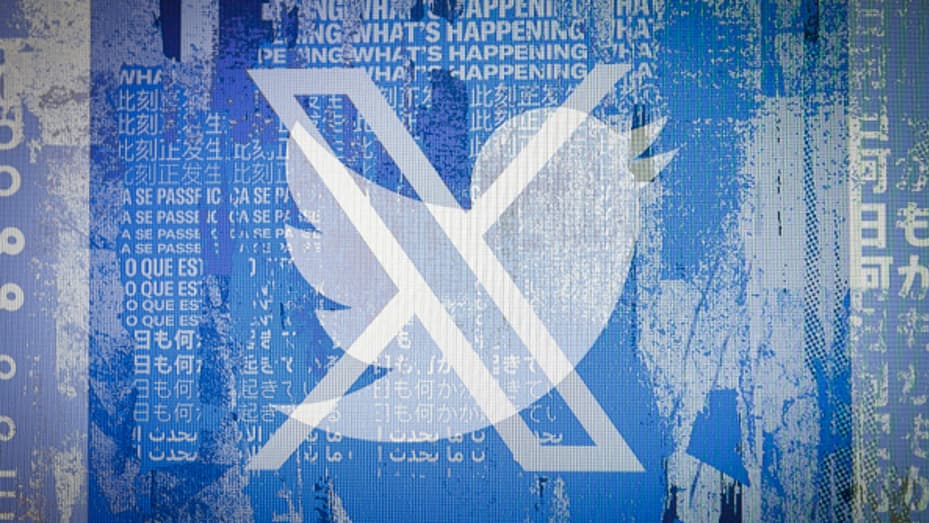 A double exposure photo shows both, the new and old version of the Twitter logo displayed on a computer screen on July 25, 2023 in Berlin, Germany.
