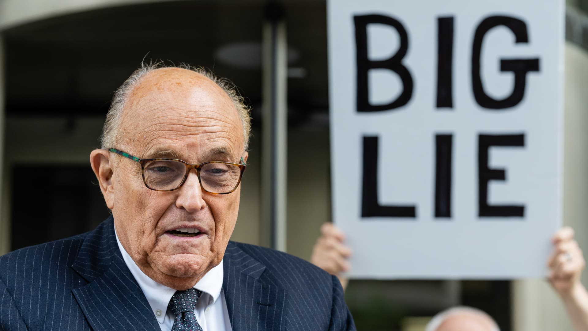 Rudy Giuliani, former lawyer to Donald Trump, speaks to members of the media as he leaves federal court in Washington, DC, US, on Friday, May 19, 2023.