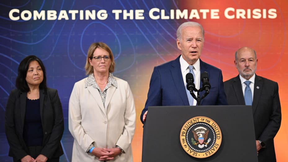 US President Joe Biden, joined by acting Labor Secretary Julie Su, FEMA Administrator Deanne Criswell, and National Oceanic and Atmospheric Administration (NOAA) Administrator Dr. Rick Spinrad, speaks during a briefing on extreme heat conditions, in the South Court Auditorium of the Eisenhower Executive Office Building, next to the White House, in Washington, DC, on July 27, 2023.