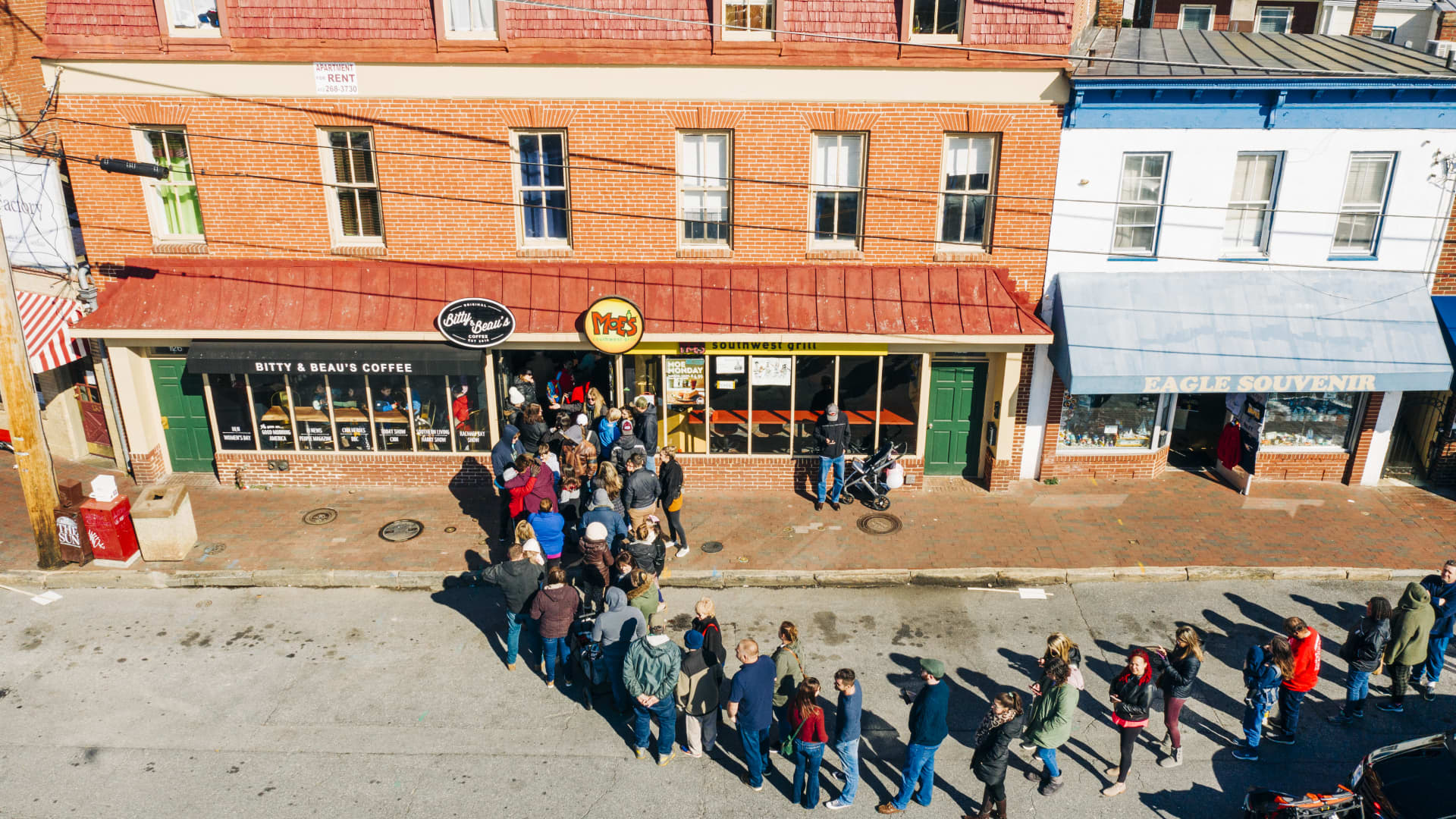 Customers in a long line outside a location of Bitty and Beau's Coffee in Annapolis, Maryland.