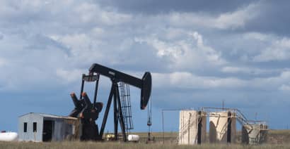 Oil prices rise on global demand forecasts, US crude stock draw