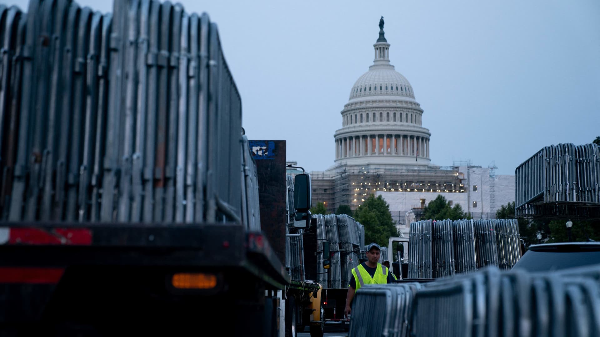 Workers set up security barricades outside the US Capitol in Washington, DC, on August 2, 2023, ahead of the arraignment of former US President Donald Trump.