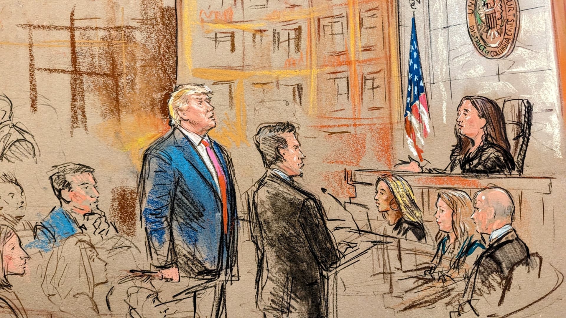 Former U.S. President Donald Trump stands next to his attorney Todd Blanche as he faces charges before Magistrate Judge Moxila A. Upadhyaya that he orchestrated a plot to try to overturn his 2020 election loss, at federal court in Washington, U.S. August 3, 2023 in a courtroom sketch.