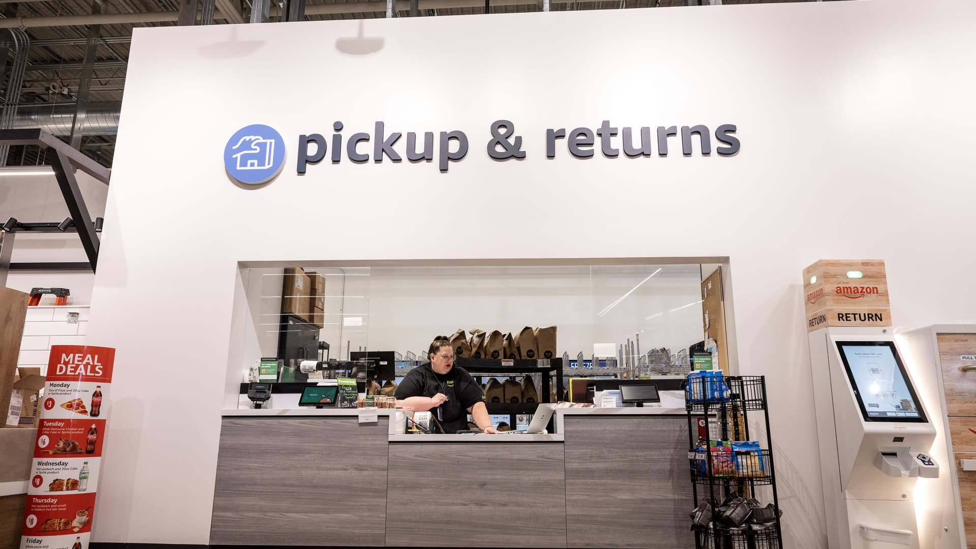 A pickup and returns counter at an Amazon Fresh grocery store in Schaumburg, Illinois, US, on Monday, July 24, 2023.