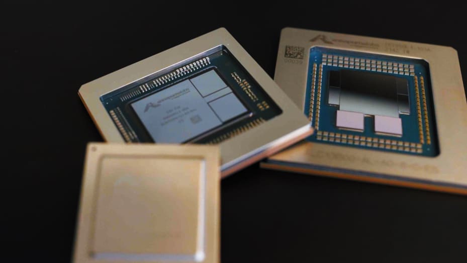 Amazon's custom chips, from left to right, Inferentia, Trainium and Graviton are shown at Amazon's Seattle headquarters on July 13, 2023.