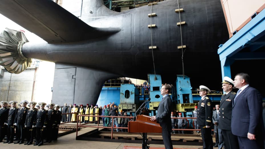 Russian President Dmitry Medvedev (R) delivers a speech in the northern Russian town of Severomorsk on June 15, 2010 at the "Sevmash" shipyard launching of a new K-329 Severodvinsksk, fourth generation multipurporse submarine. Yasen class submarine, also known as the Severodvinsk class, is a new Russian nuclear multipurpose attack submarine class. The submarine is based on the Akula-class submarine and the Alfa-class submarines and are projected to replace Russia's older Soviet-era class attack submarines b