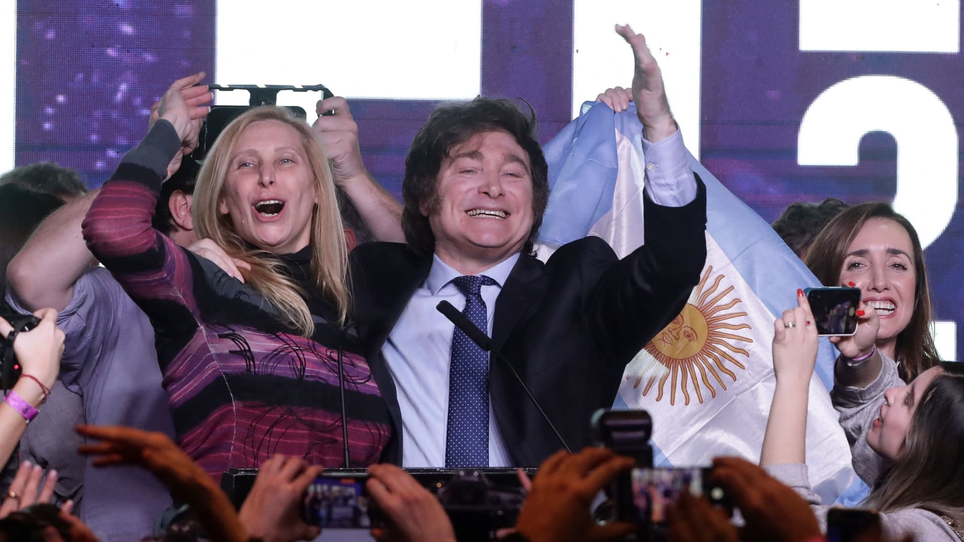Argentina devalues its currency, jacks up interest rates after shock far-right primary win