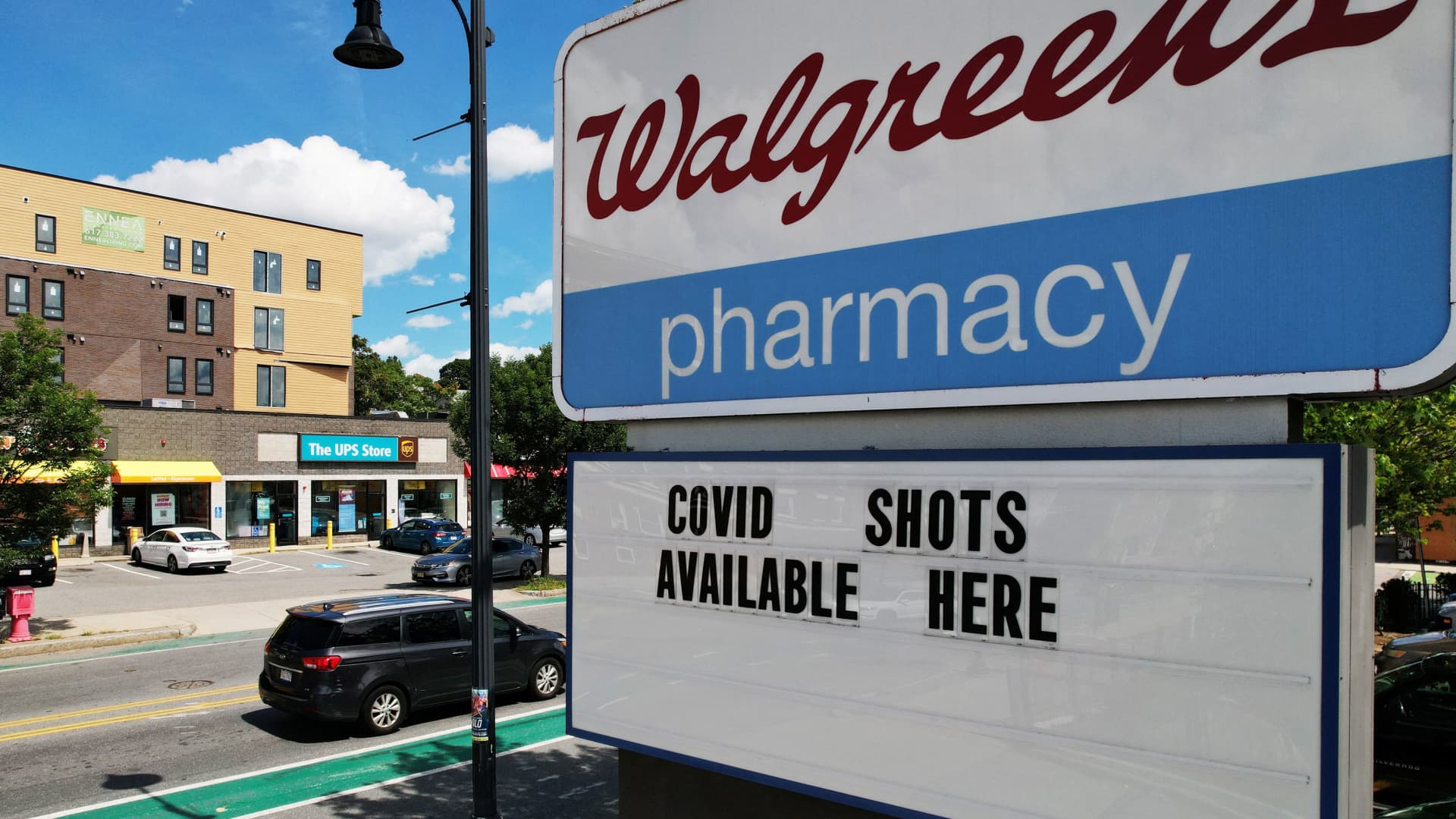 A sign advertises COVID-19 (coronavirus) vaccine shots at a Walgreens Pharmacy in Somerville, Massachusetts, August 14, 2023.