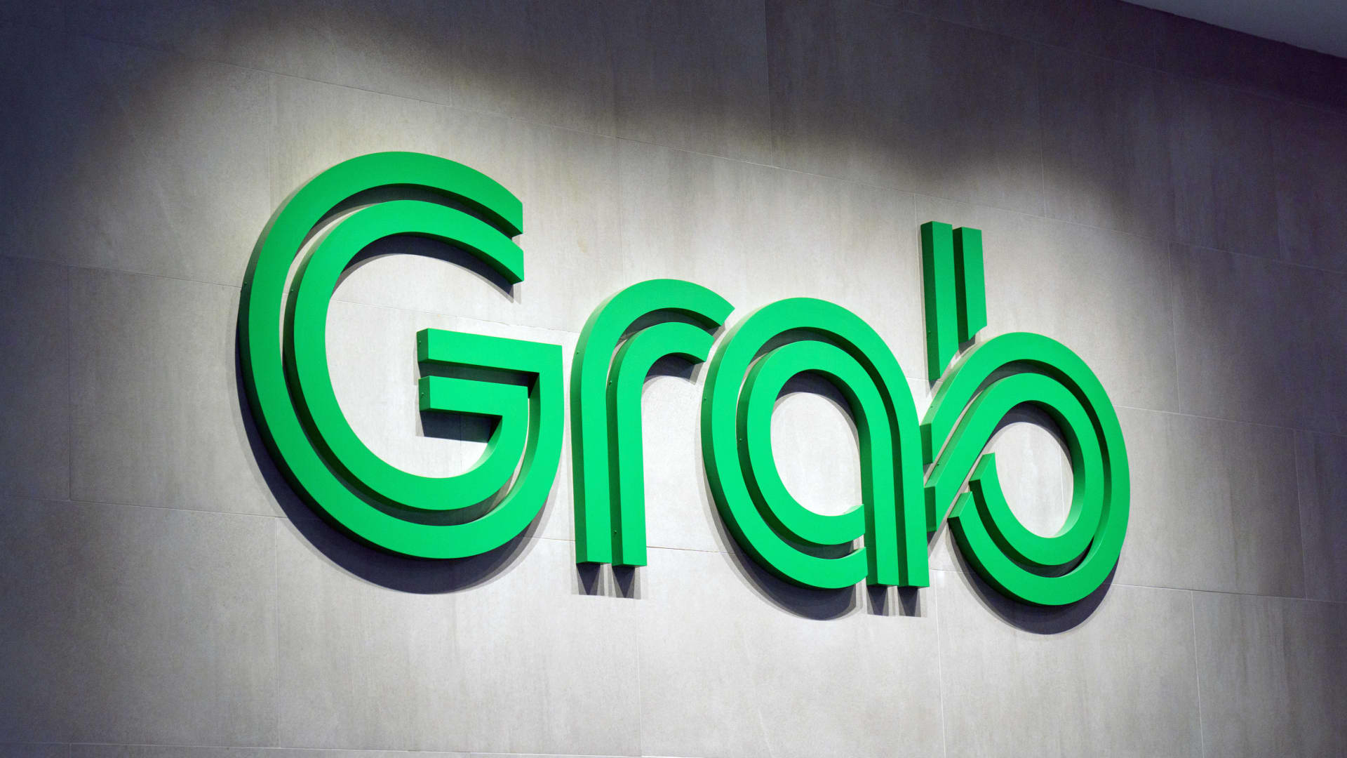 Singapore's Grab says its ride-hailing unit is on track to hit pre-Covid levels by the end of the year