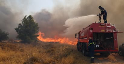Europe battles raging wildfires and shipping disruption in summer of extremes