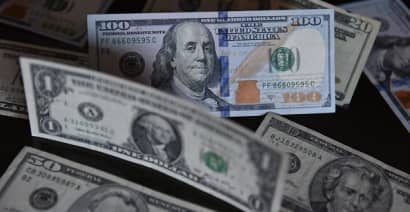Dollar eases during thin Black Friday as traders bet rates have peaked