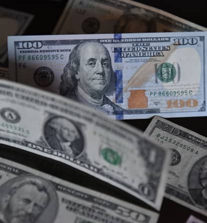 Dollar steady as Fed's Powell says higher rates may be needed 