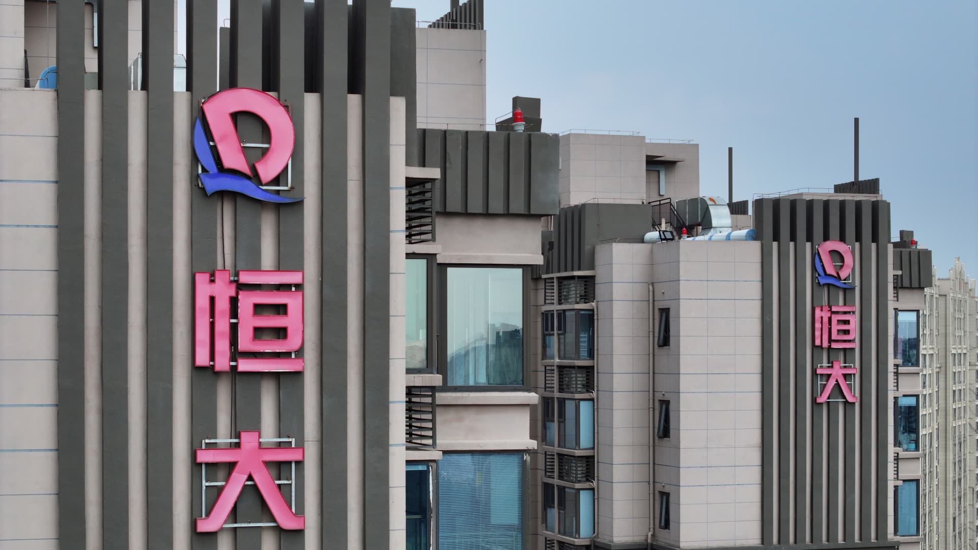 Evergrande shares rise over 9% as court hearing to wind up property firm is postponed again