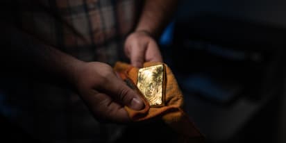 Gold firms on dollar dip as US inflation test looms