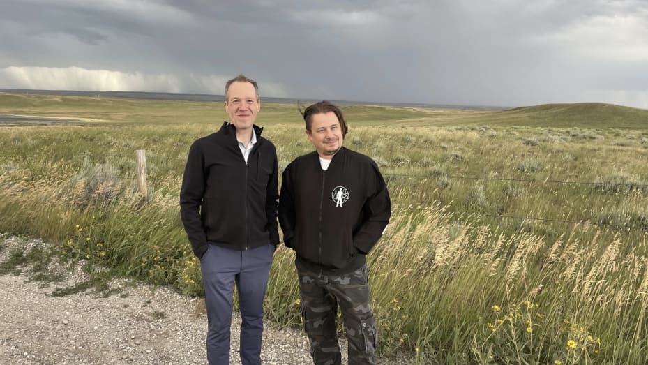 CEO Charles Cadieu (L) and CTO Matt Lee standing in front of the future home of the Spiritus Orchard facility, located in the Western U.S. (The exact location is not yet public.)