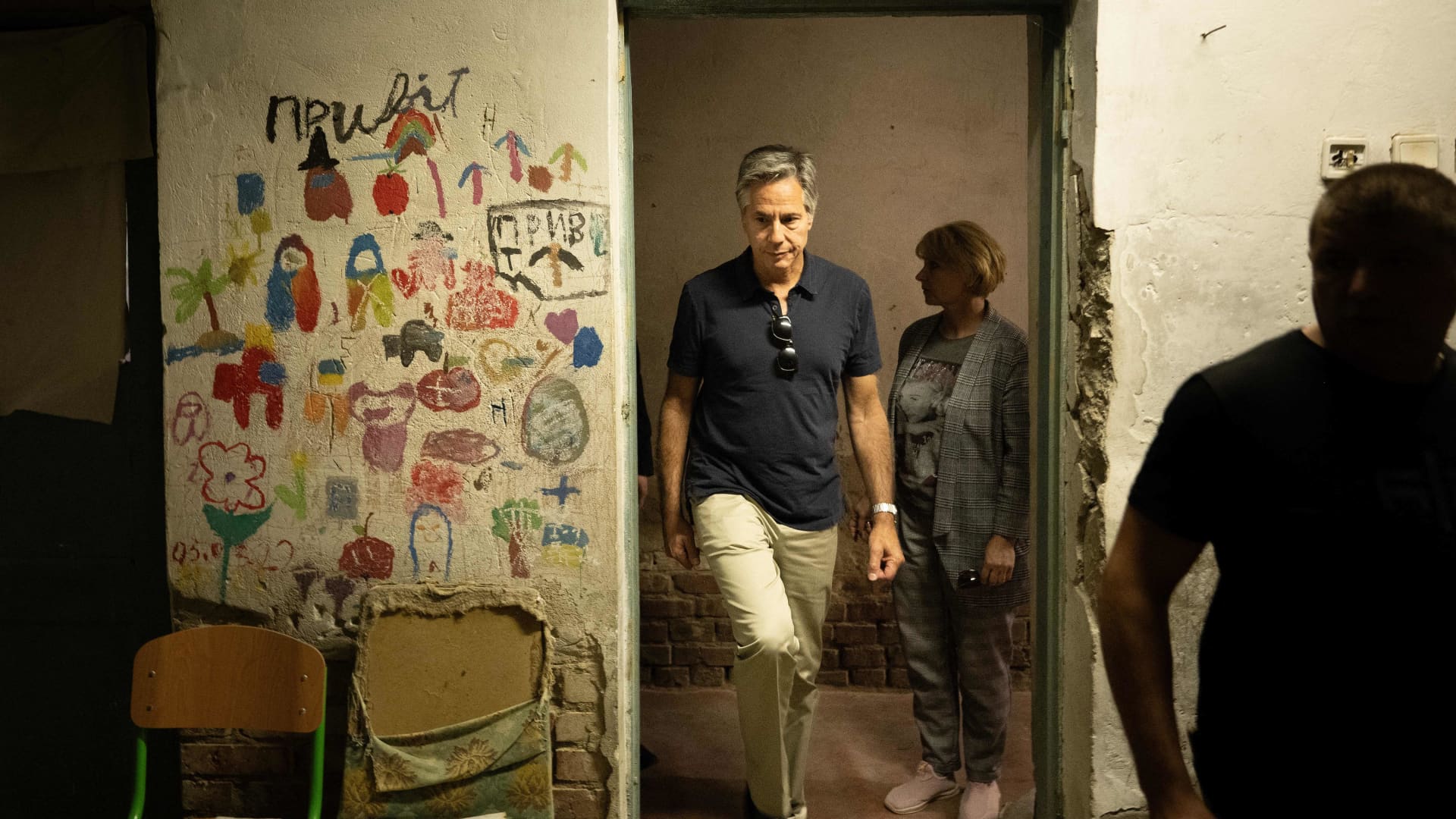 U.S. Secretary of State Antony Blinken enters a basement reportedly used to hold people captive while he tours the Yahidne School which is being turned into a museum, in Yahidne on September 7, 2023.