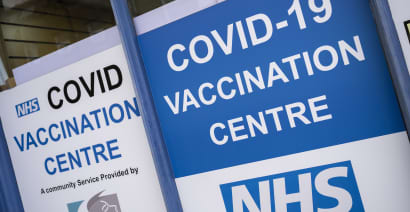 Covid vaccine rollout begins early in the UK with new variant under watch
