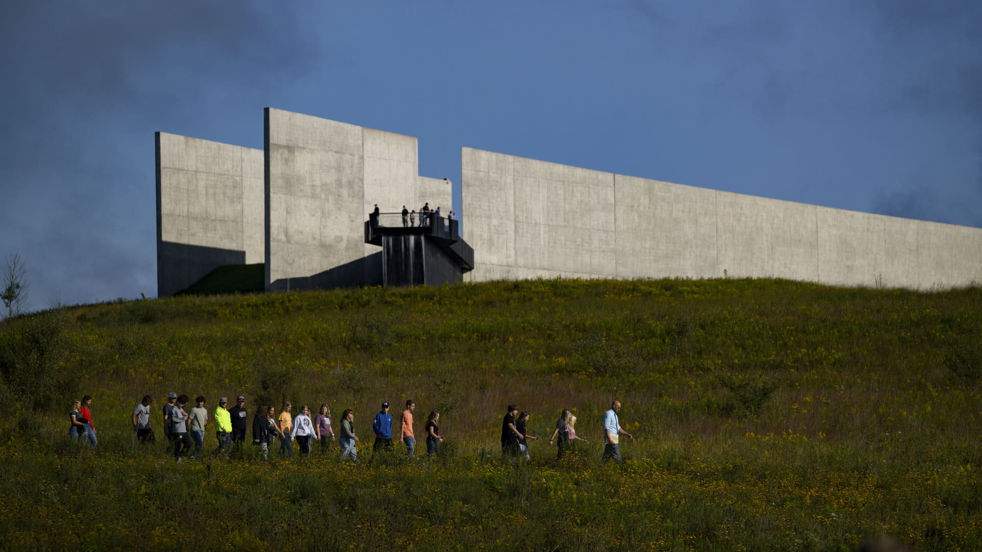 Visitors stroll through the national park grounds during a ceremony commemorating the 22nd anniversary of the crash of Flight 93 during the September 11, 2001 terrorist attacks at the Flight 93 National Memorial on September 11, 2023 in Shanksville, Pennsylvania. 