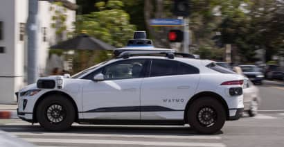 Uber begins offering rides in self-driving Waymo cars