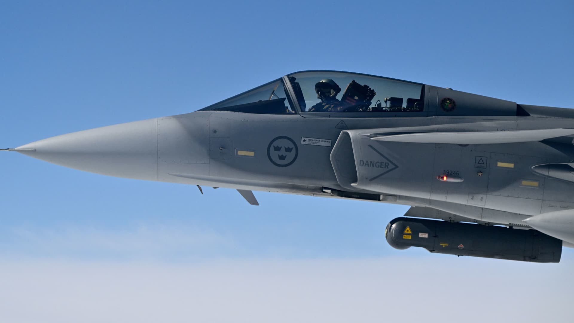 A Swedish Air Force Saab JAS 39 Gripen jetfighter takes part in the NATO exercise as part of the NATO Air Policing mission, in Alliance members' sovereign airspace on July 4, 2023.